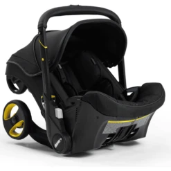 Doona Autostoel Midnight Edition Zwart Met Volledig Geïntegreerd Chassis 2 In 1